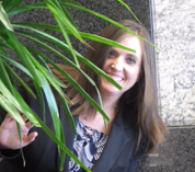 Keri H funny photo (she is hiding behind a plant)