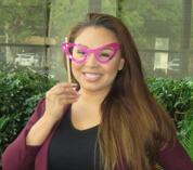 Niki L funny photo (she is holding up a funny mask)