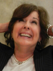 Signe F funny photo (she is looking up with her hands behind her head)
