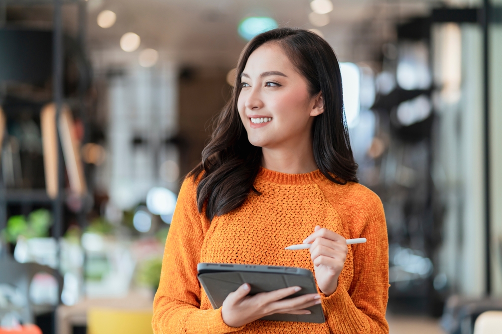 Woman working on her tablet