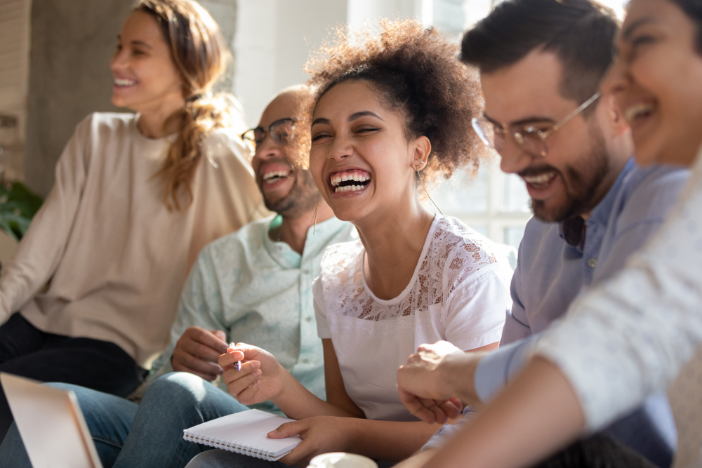 A group of coworkers laughing